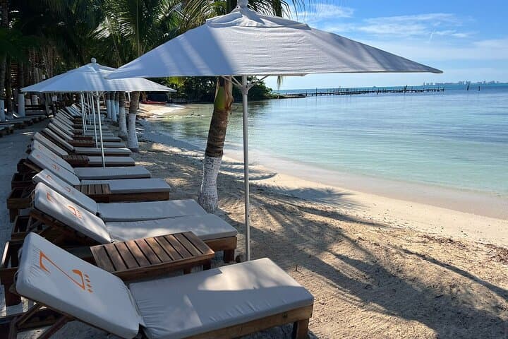 Catamaran to Isla Mujeres from Cancun — Open-Bar Snorkel & Beach Club Day photo 2