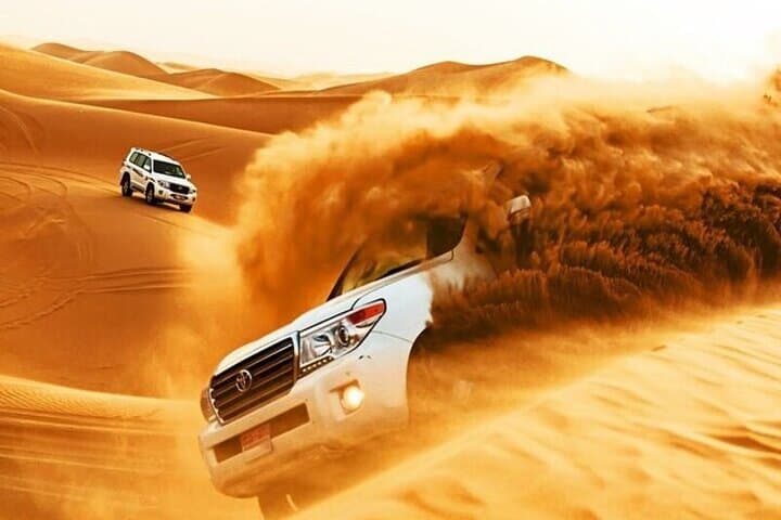 Evening Desert Safari Dubai: Dune Bashing & BBQ Dinner at Sunset