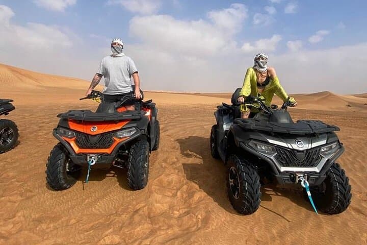 Dubai Red Dunes Quad Bike Adventure with Pickup photo 2