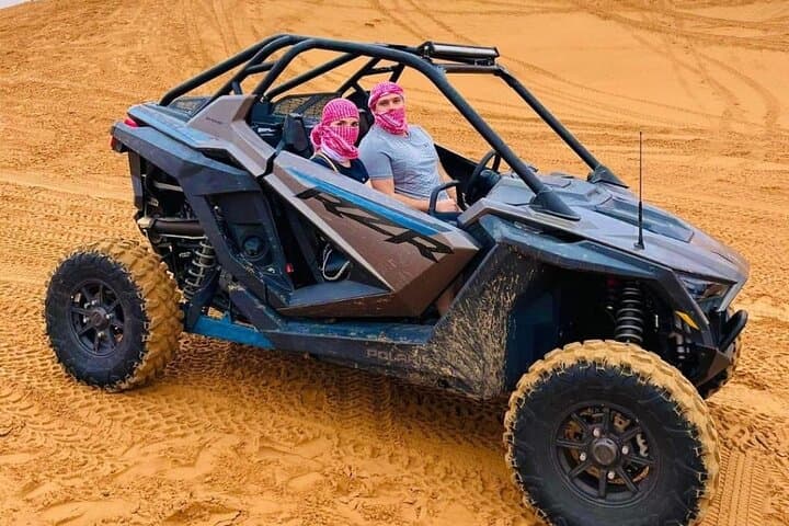 Drive a 1000cc Dune Buggy Across Dubai’s Red Sands: Sunset Safari, Sandboarding & BBQ photo 5