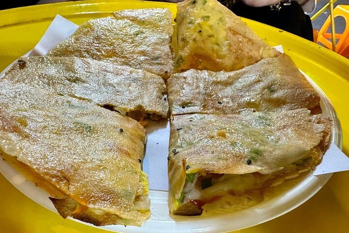 Saigon by Night: Motorbike Street Food Tour Through Districts 1 & 3 photo 2