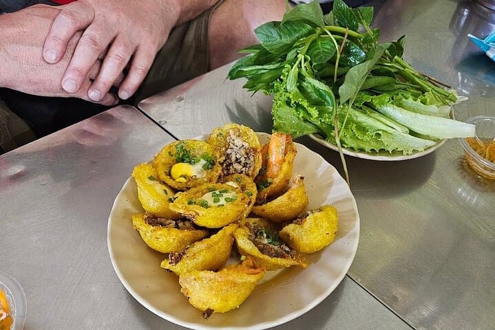 Saigon by Night: Motorbike Street Food Tour Through Districts 1 & 3 photo 5