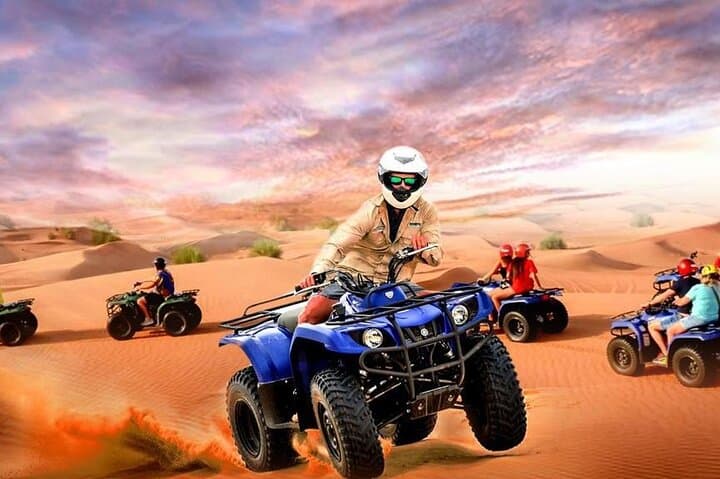 Red Dunes Desert Safari: ATV, Sandboarding, Camel Ride & BBQ Dinner in Dubai