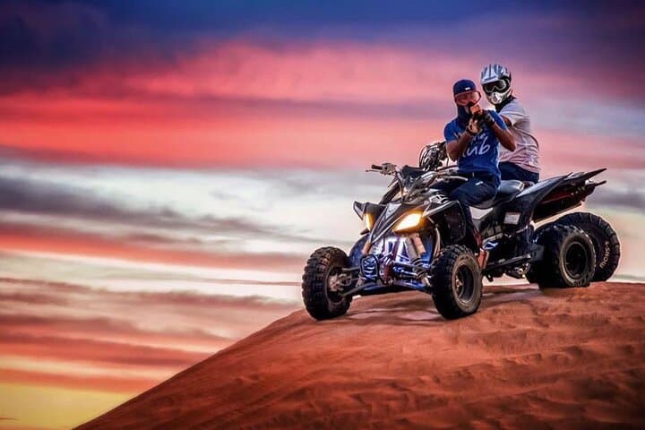Red Dunes Desert Safari: ATV, Sandboarding, Camel Ride & BBQ Dinner in Dubai photo 2
