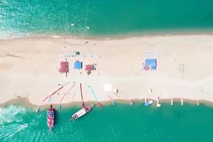 Side Dolphin Island Boat Tour — Swim, Snorkel & Foam Party (6-Hour) photo 4