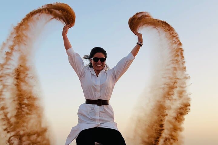 Morning Red Dune Safari Dubai: Sandboarding, Dune Bashing & Camel Ride