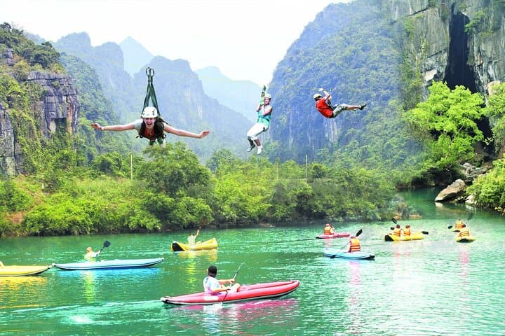 Phong Nha & Dark Cave Full-Day Adventure — River Boat, Caving, Zipline and Mud Bath photo 6