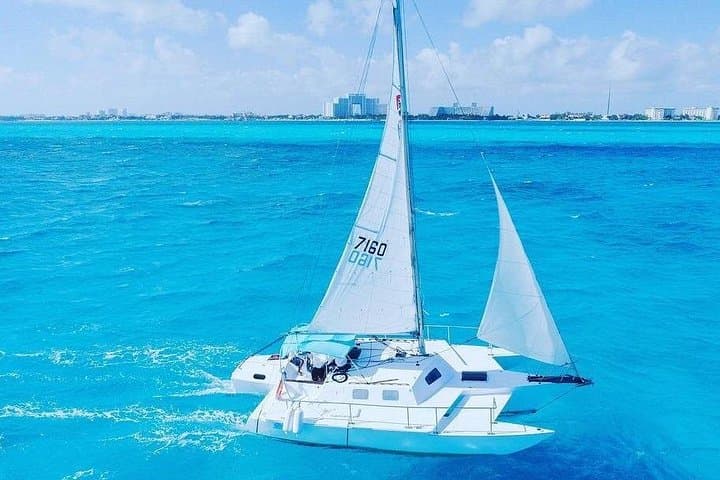 Catamaran to Isla Mujeres: Snorkel, Beach Club Buffet & Ice Bar Experience photo 3