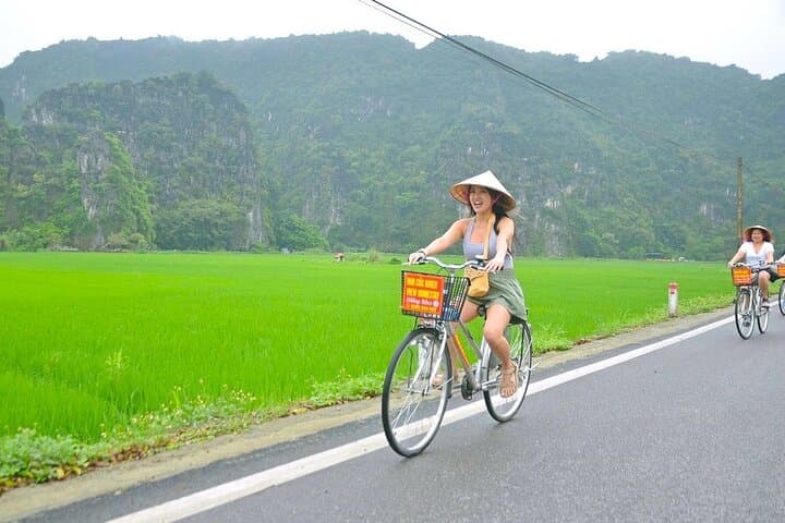 Full-Day Hoa Lu, Tam Coc & Mua Caves Tour from Hanoi — Boat, Bike & Mountain Views