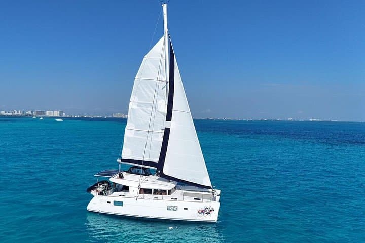Catamaran Party to Isla Mujeres: Snorkel, Beach Club & Open Bar from Cancun photo 3