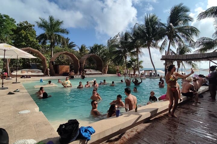 Catamaran Sailing to Isla Mujeres with Luxury Beach Club from Cancun photo 4