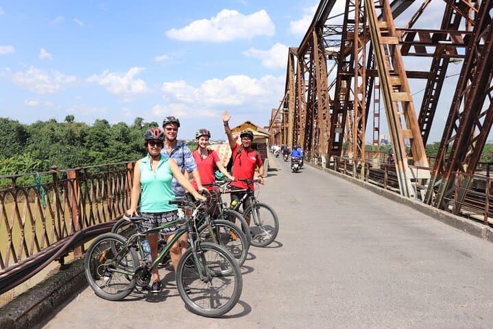 Hanoi Biking: Long Bien Bridge to Red River Island Half-Day Tour photo 2