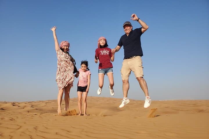 Dubai Evening Desert Safari: Dune Bashing, Sandboarding & Bedouin Dinner photo 4