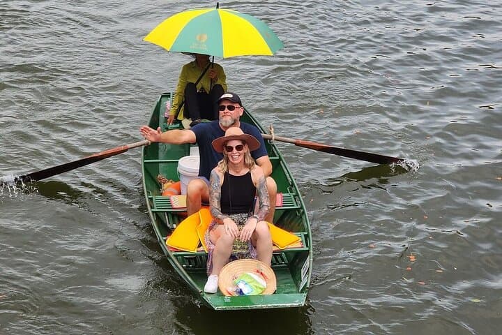 Day Trip to Hoa Lu & Tam Coc: Biking, Bamboo Boat on Ngo Dong and Ancient Temples photo 4