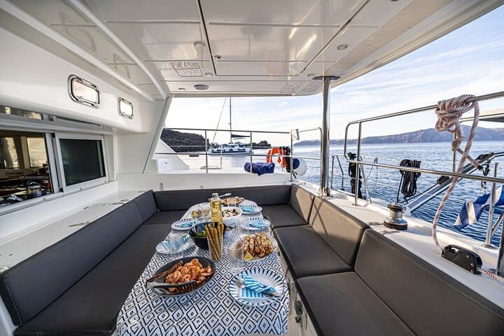 Santorini Semi-Private Catamaran Sunset Cruise with Hot Springs & BBQ photo 2