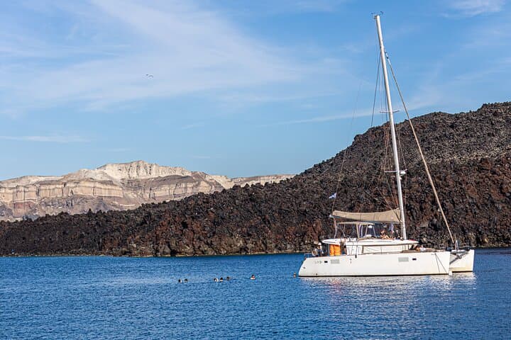 Santorini Semi-Private Catamaran Sunset Cruise with Hot Springs & BBQ photo 3