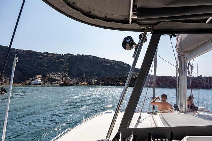 Santorini Semi-Private Catamaran Sunset Cruise with Hot Springs & BBQ photo 4