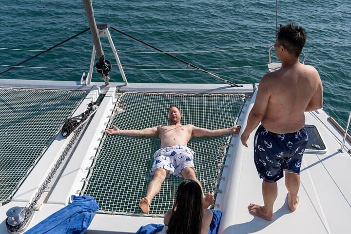Santorini Semi-Private Catamaran Sunset Cruise with Hot Springs & BBQ photo 6