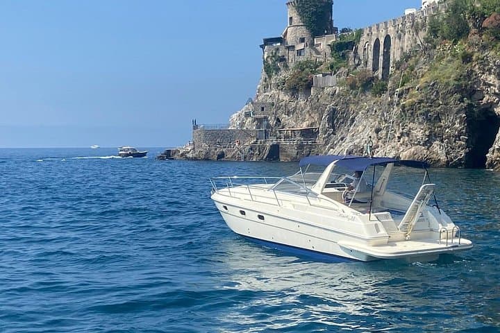 Full-Day Private Boat Excursion Along the Amalfi Coast: Caves, Snorkeling & Li Galli photo 1