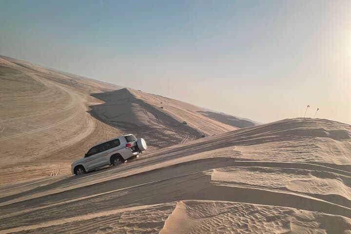 Doha Desert Safari: Dune Bashing, Camel Ride & Inland Sea Adventure photo 1