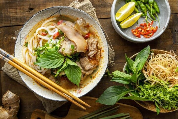 Saigon Night Scooter Food Tour: See the City Like a Local photo 3