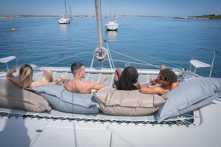 Catamaran to Ilha de Tavira: 3.5-Hour Private Coastal Cruise from Faro