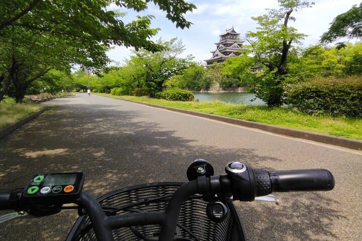 Hiroshima Scenic E‑Bike Tour: Peace Park, Castle Moat & Hidden Temples