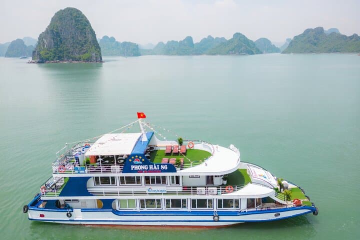 Halong Excursion Deluxe Cruise: Kayak, Cave & Sunset Party from Tuan Chau