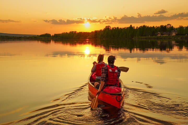 Midnight Sun Canoe Tour in Rovaniemi — Sunset Paddling Under Arctic Light