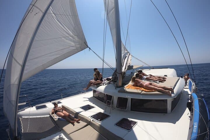 Catamaran Day Cruise from Alghero to Capo Caccia: Snorkel, SUP & Lunch photo 2