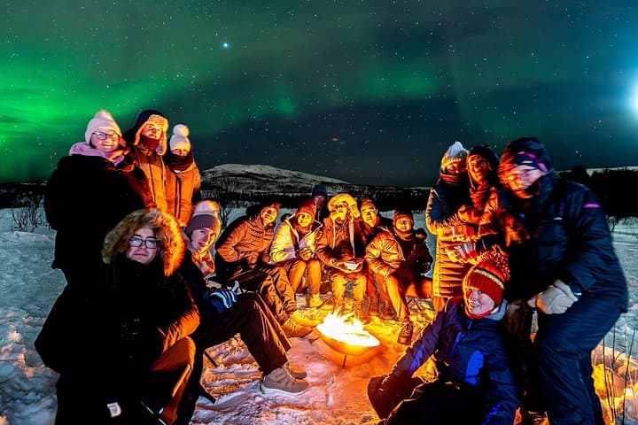 Tromso Aurora Chase: Minibus Northern Lights Tour with Thermal Suit and Photos photo 1
