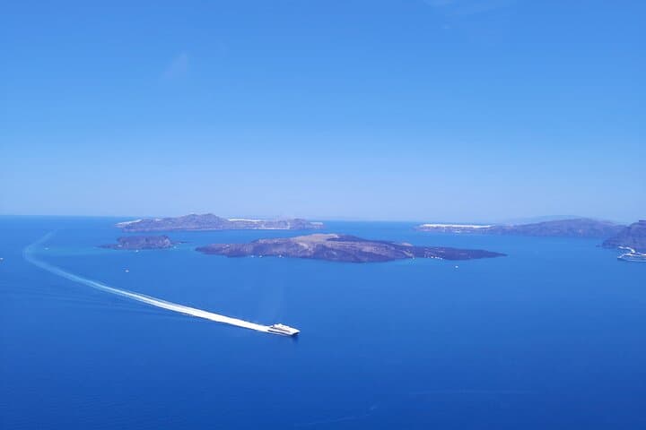Santorini Helicopter Tour: 20-Minute Caldera Flight Over Oia, Volcano & Red Beach photo 5