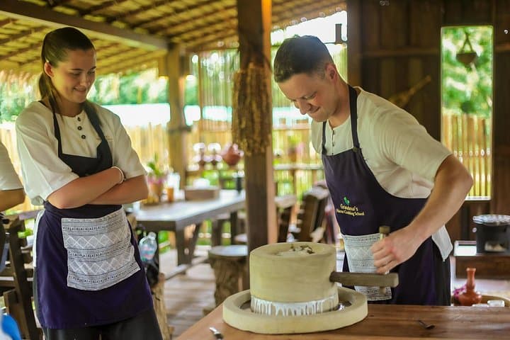 Hands-On Lanna Cooking Class in Chiang Mai: Market, Farm & Traditional Techniques photo 3