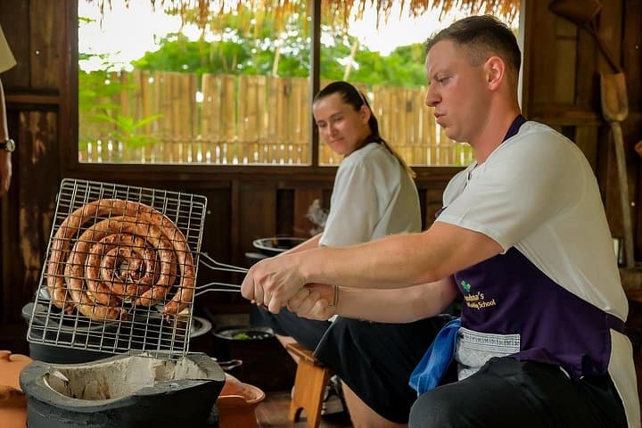 Hands-On Lanna Cooking Class in Chiang Mai: Market, Farm & Traditional Techniques photo 4