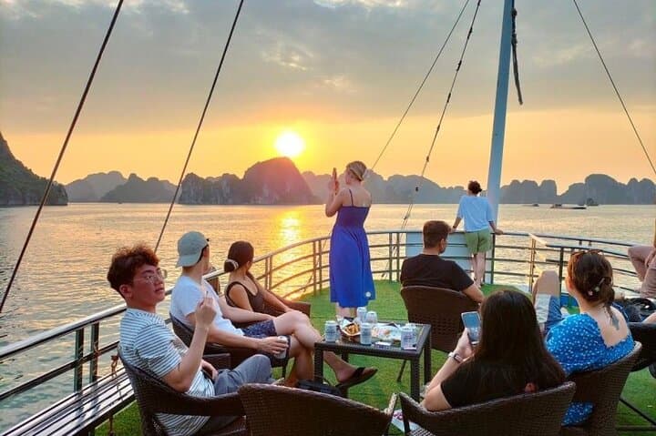 Full-Day Ha Long Bay Sunset Cruise with Kayaking & Sung Sot Cave