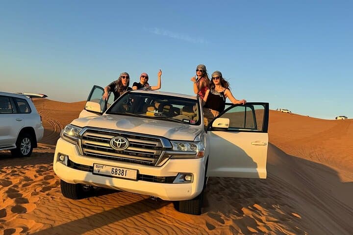 Red Dunes Desert Safari in Dubai: Dune Bashing, Camel Rides & BBQ Evening