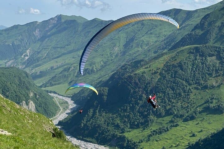 Soar Above Gudauri: Tandem Paragliding Flights Over the Caucasus