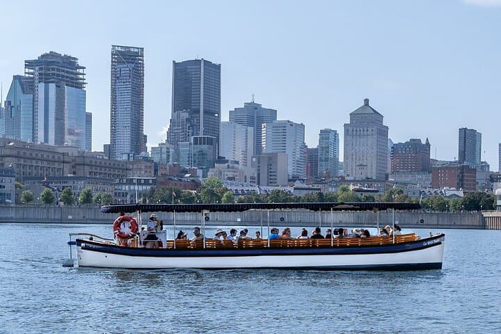 Silent Electric Boat Cruise in Montreal: Guided Waterfront Tour with Onboard Drinks photo 2