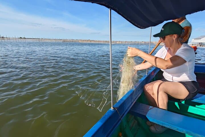 Sunset on Tam Giang Lagoon — Sampans, Net-Casting & Hue's Coastal Evenings
