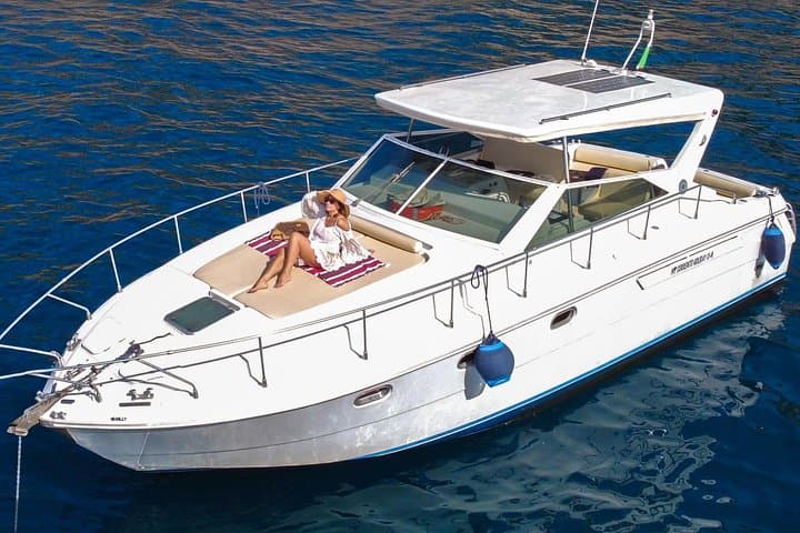Sorrento to Capri Shared Boat Tour — Blue Caves, Swim Stops & Villa Tiberius Views photo 2
