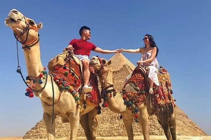 Private Cairo day tour from Luxor by air — Giza pyramids, Sphinx, Museum & Citadel photo 1