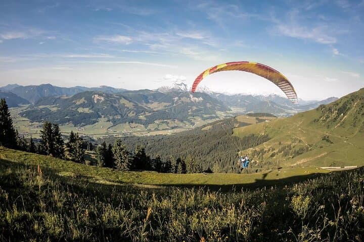 Tandem Paragliding Over St. Johann in Tyrol: 60-Minute Flight Above the Kaiser Mountains