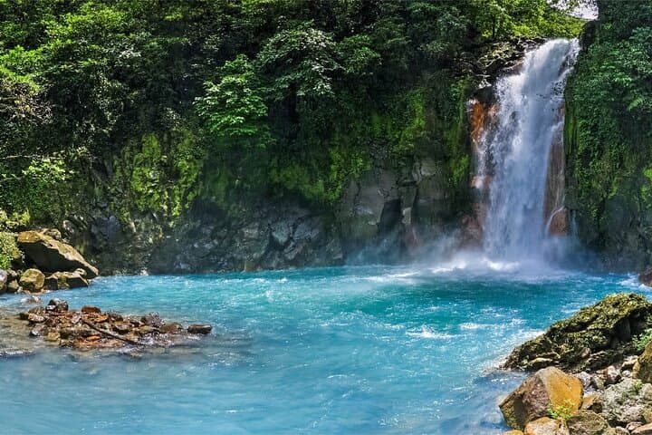 Rio Celeste Tubing & Tenorio Volcano Private Tour — Rainforest, Waterfall & Sloth Viewing