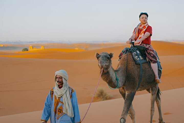 4-Hour Morning Red Dune Safari in Dubai — Camel Ride, Sandboarding & Dune Bashing photo 6