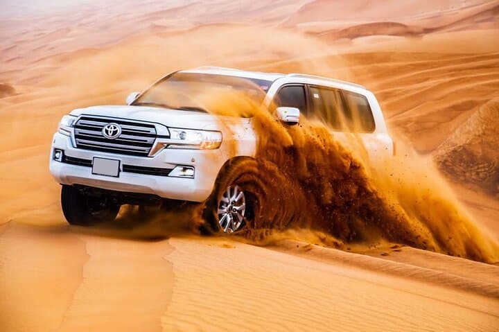 Dubai Evening Desert Safari: Dune Bashing, BBQ Buffet & Live Shows