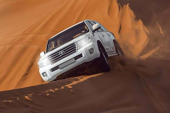 Red Dunes Desert Safari Dubai: Sunset Dune Bashing, Camel Rides & BBQ Dinner photo 3