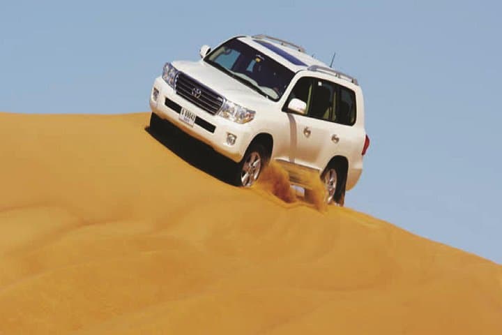 Dubai Desert Safari With BBQ Dinner: Lahbab Dune Bashing, Camel Rides & Cultural Camp photo 4