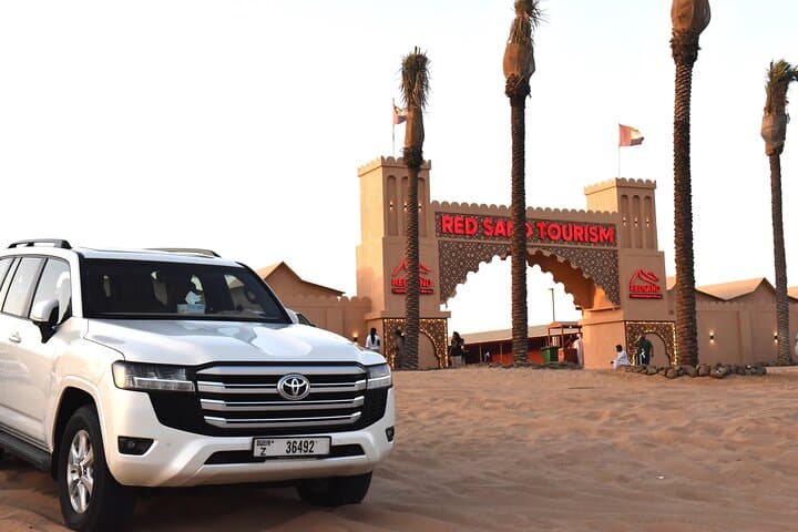 Dubai Red Dunes Desert Safari: Evening BBQ, Camel Ride & Sandboarding