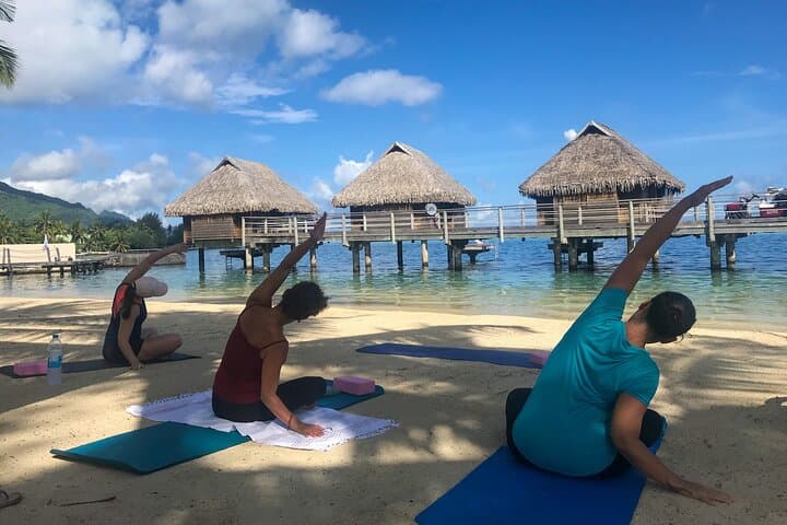 Sunrise Beach Yoga at Manava Moorea — 90-Minute Group Class photo 3
