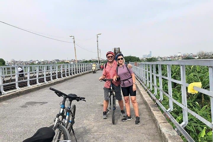 Hanoi Biking: Long Bien Bridge to Red River Island Half-Day Tour